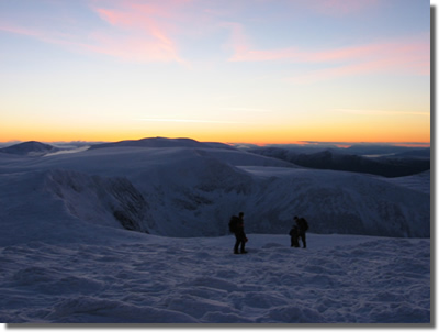 Photo looking roughly south-west from just below the summit of Cairngorm shortly after sunset