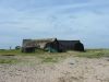 Huts at the harbour edge